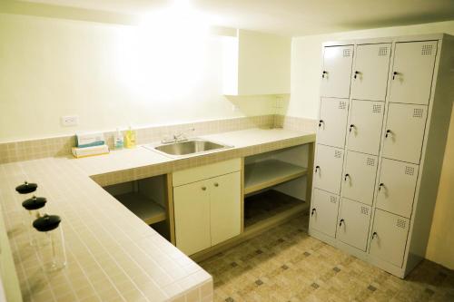 Kuchyň nebo kuchyňský kout v ubytování Yogi-Homestay