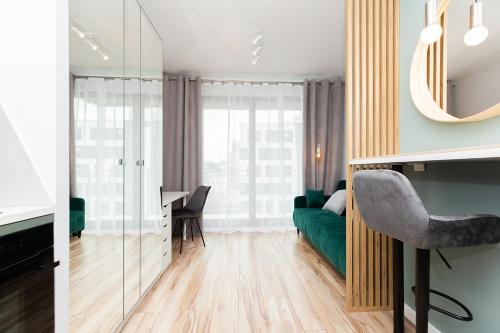 Posedenie v ubytovaní Cozy apartment Jana Kazimierza, Wola