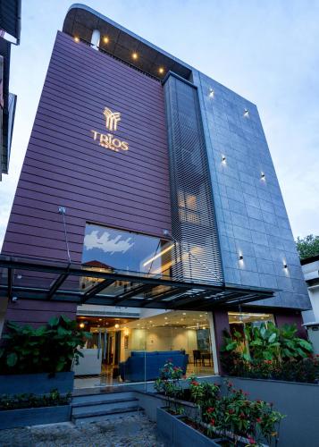a tesco building with a sign on it at The Trios Hotel in Cochin