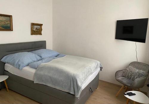 Postel nebo postele na pokoji v ubytování Ziel
