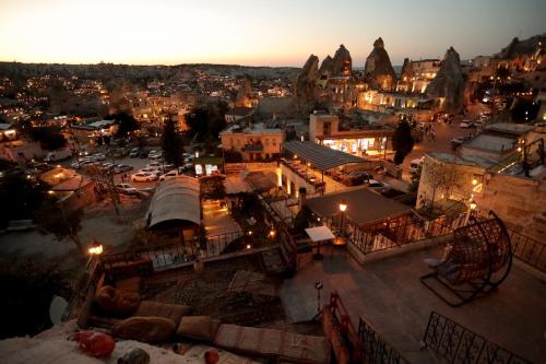 an aerial view of a city at night at Asteria Cave Hotel in Goreme