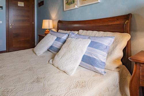 Postel nebo postele na pokoji v ubytování Agriturismo Sarmore