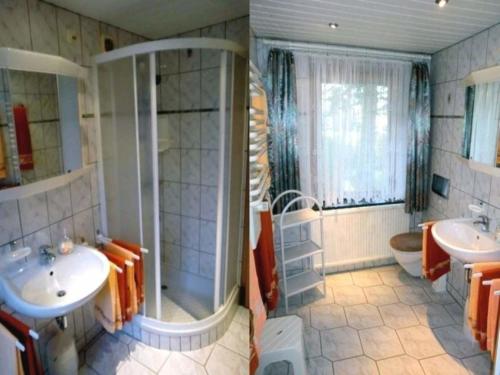 a bathroom with two sinks and a shower and a toilet at Ferienhaus Karin in Cranzahl