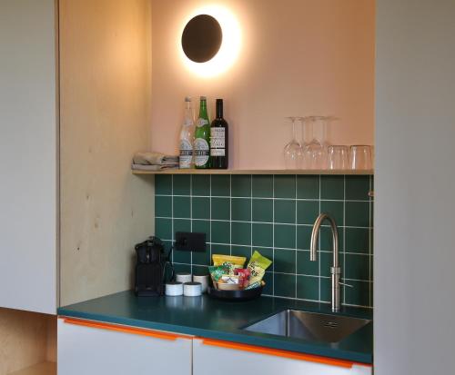 Cuisine ou kitchenette dans l'établissement Basecamp Amsterdam
