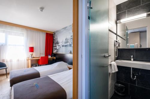 Kuchyň nebo kuchyňský kout v ubytování Bastion Hotel Haarlem Velsen