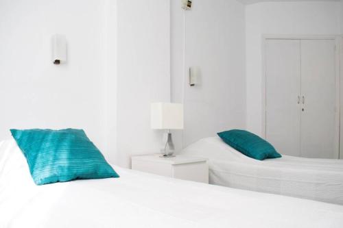 Posteľ alebo postele v izbe v ubytovaní Guayero, Bel appartement à 50m de la mer