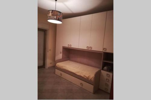 Postel nebo postele na pokoji v ubytování Casa Helios con ascensore