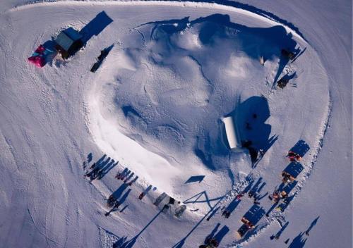 an aerial view of a small island in the snow at Village Igloo Val Thorens in Val Thorens