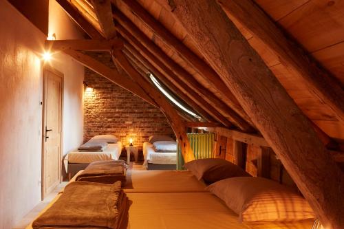 Säng eller sängar i ett rum på Het Klaverhof