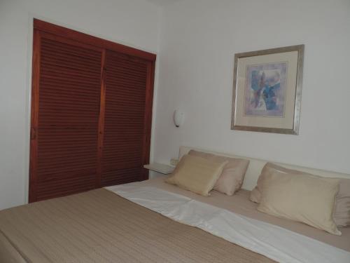 Postel nebo postele na pokoji v ubytování Apartment-Hotel Altamira