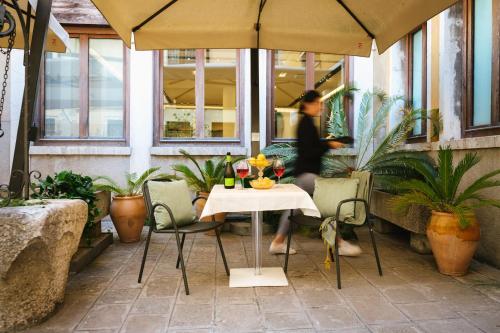 ヴェネツィアにあるホテル ド ポッツィのギャラリーの写真