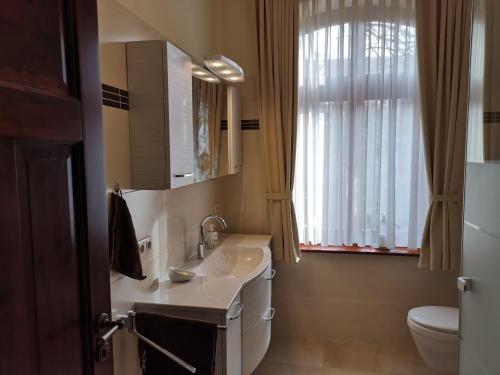 Koupelna v ubytování FeWo Stendal