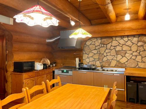 A kitchen or kitchenette at Okayama Hiruzen Villas Peter Pan