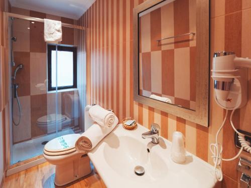 Koupelna v ubytování Hotel Los Toreros