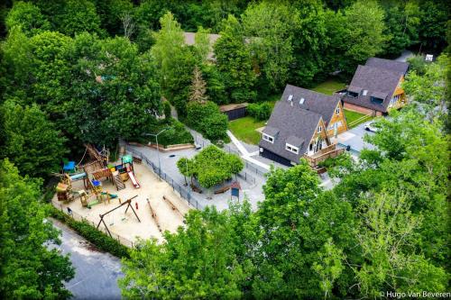 an aerial view of a park with a playground at De Berghut Durbuy - Chalet nr 104 in Durbuy