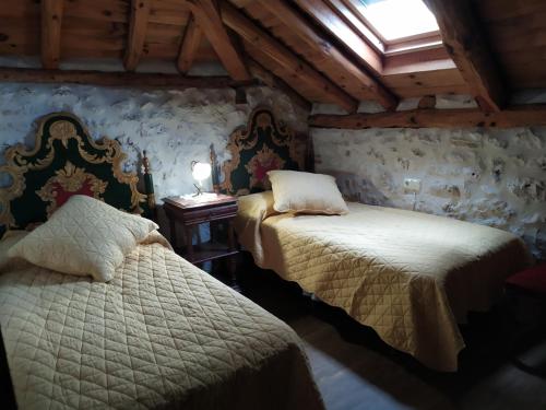 Ein Bett oder Betten in einem Zimmer der Unterkunft Casa Rural Las Cotarras