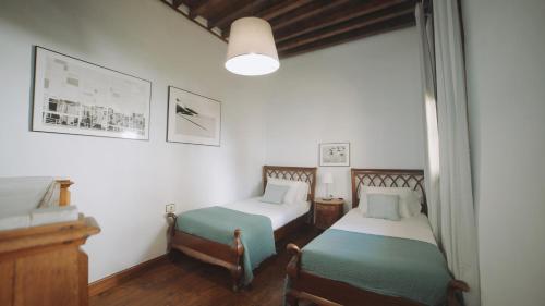 Casa La Monja 객실 침대