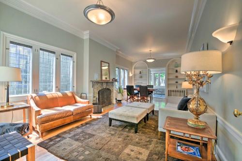 a living room with a couch and a fireplace at Classic Oak Park Home, 11 Mi to Downtown Chicago! in Oak Park