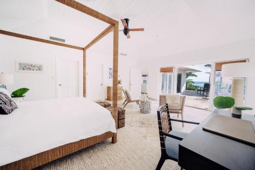 A bed or beds in a room at Pink Sands Resort