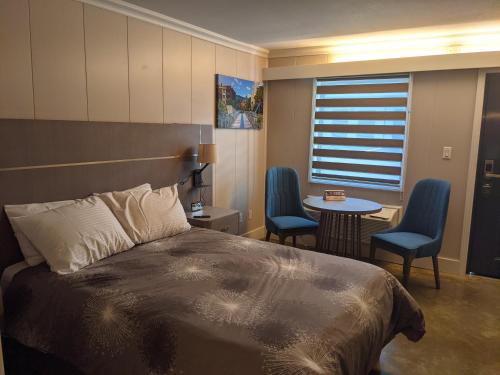 Un pat sau paturi într-o cameră la Stay Express Inn Chattanooga