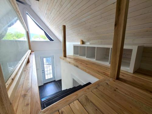 a view of the inside of a tiny house at Aux 4 vents - Auberg'Inn in Carleton sur Mer