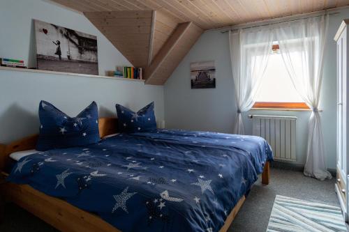 Postel nebo postele na pokoji v ubytování Ferienwohnung Glückauf