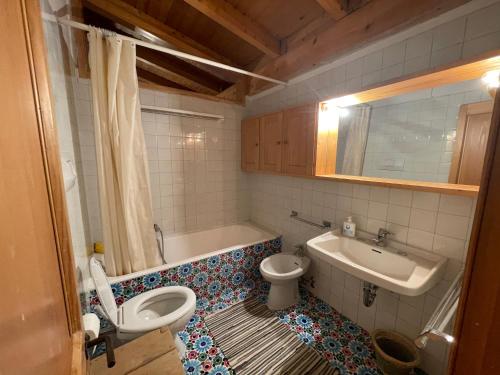 Een badkamer bij Casa Vacanze a Madonna di Campiglio
