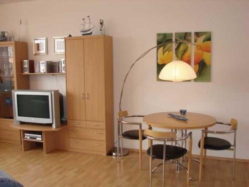 TV a/nebo společenská místnost v ubytování Blütenzauber Apartment No 2