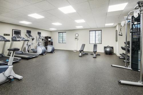 a gym with treadmills and machines in a room at Staybridge Suites Of Durham - Chapel Hill - RTP by IHG in Durham