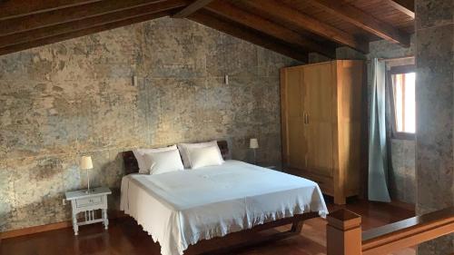 A bed or beds in a room at Casa Canaria