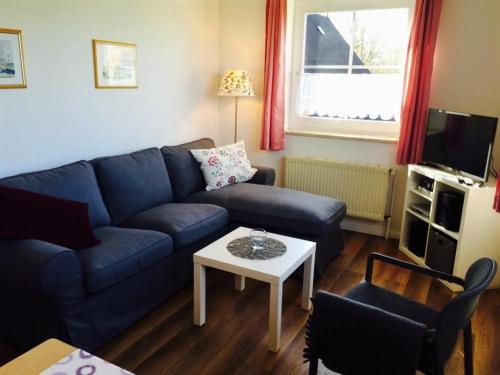 Coin salon dans l'établissement Ferienwohnung 7, OG, Hof zur Sonnenseite Fehmarn