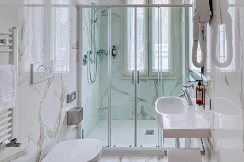 Koupelna v ubytování Hotel Nuovo Teson