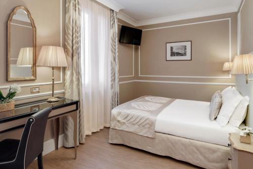 Katil atau katil-katil dalam bilik di Hotel Nuovo Teson