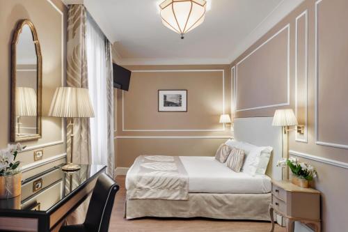 Katil atau katil-katil dalam bilik di Hotel Nuovo Teson
