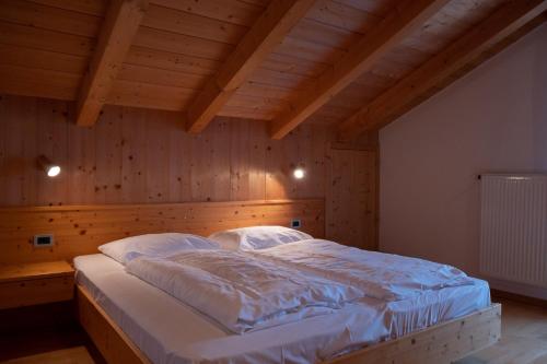 Кровать или кровати в номере Ferienwohnung im Haus Texel VI