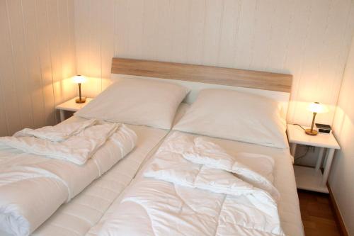Krevet ili kreveti u jedinici u okviru objekta Wohnung 2 - G Pape - schöne Terassenwohnung mit sep Ankleidezimmer, kostenloses WLAN, Longstay Rabatt, Nähe Dünenpark