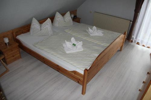 Postel nebo postele na pokoji v ubytování Ferienwohnung Waldzwerge