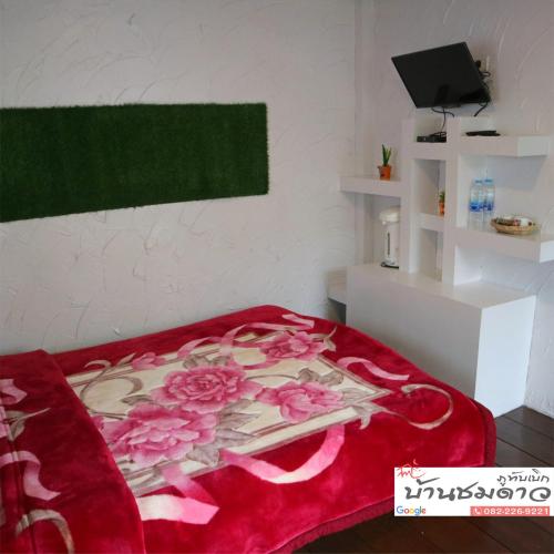Postel nebo postele na pokoji v ubytování บ้านชมดาว ภูทับเบิก