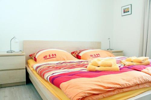 Postel nebo postele na pokoji v ubytování L3 - Ferienanlage Lindenstraße 1 - FERIENDOMIZIL HOLLICH