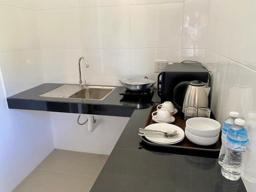 Dapur atau dapur kecil di Pure Laguna Residence by Nice Sea Resort