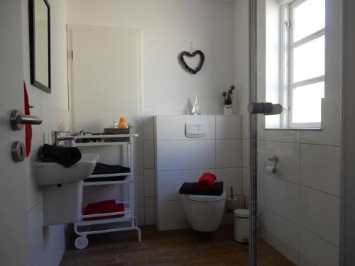 Een badkamer bij Ferienhaus Am Nordstrand