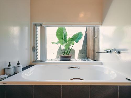 Ett badrum på IMAGINE OKINAWA -stay-