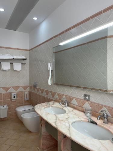 Ванна кімната в Aragosta Hotel & Restaurant