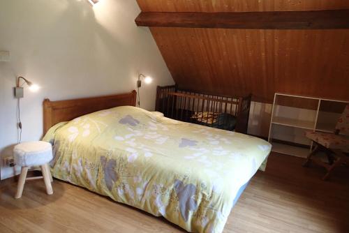 Postel nebo postele na pokoji v ubytování artiguelongue grange restaurée
