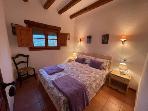 Postel nebo postele na pokoji v ubytování Masia Catalana SolSenyor by El Secret de la Conca