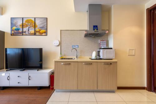 Kuchyň nebo kuchyňský kout v ubytování Gubei Town Boutique Homestay