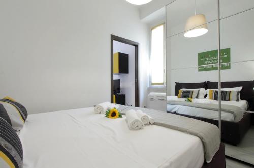 Posteľ alebo postele v izbe v ubytovaní 4BNB - Ombrellari 4
