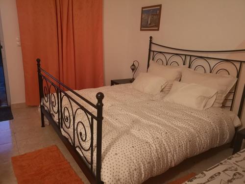 מיטה או מיטות בחדר ב-Casa da Paz-Martinchel