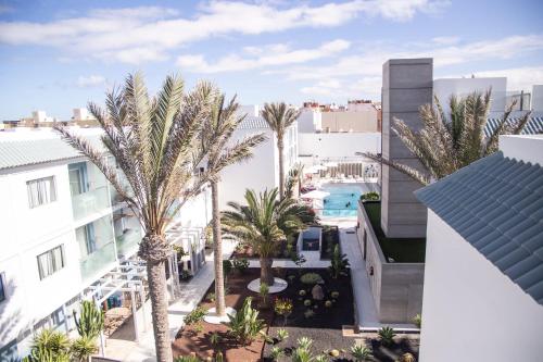 Swimmingpoolen hos eller tæt på Casa Perla - Cozy Apartment Pool Side