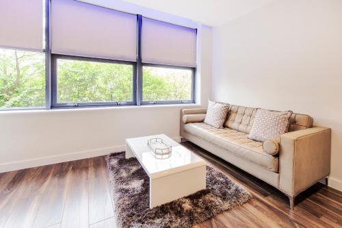 A seating area at City Stay Apartments - Centro 